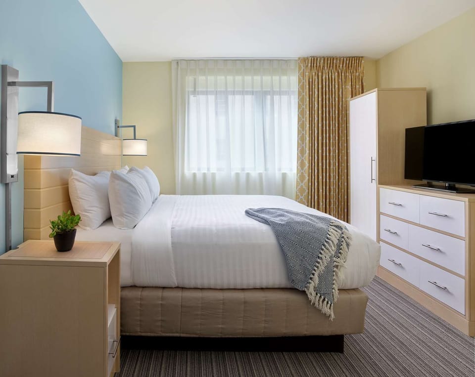 Settle into a bright, peaceful bedroom designed for deep rest