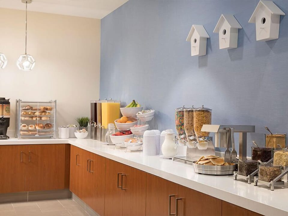 Start your morning with a generous, colorful breakfast spread.
