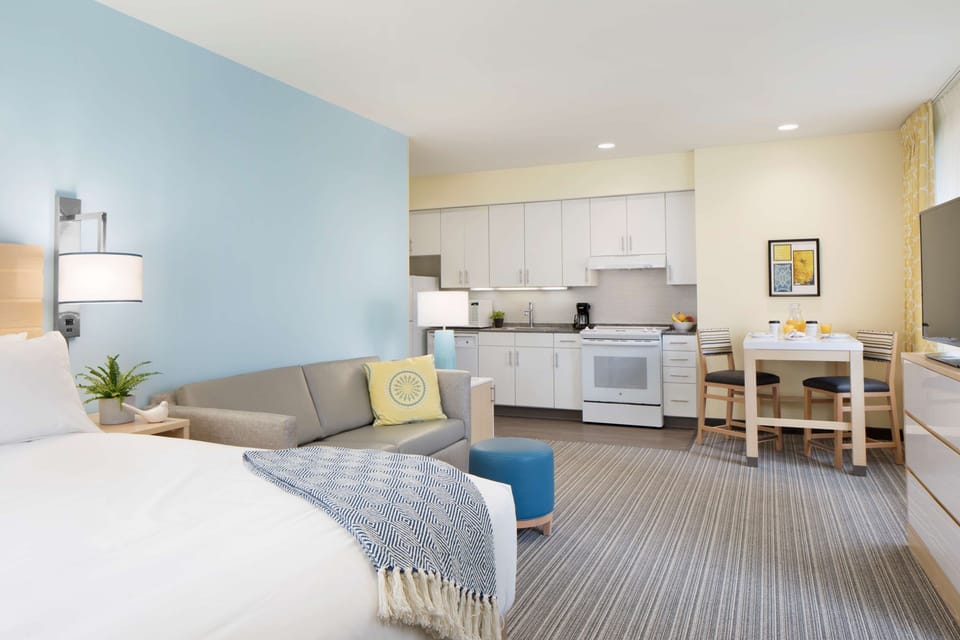 Settle into an airy studio with lounge and kitchen flow.