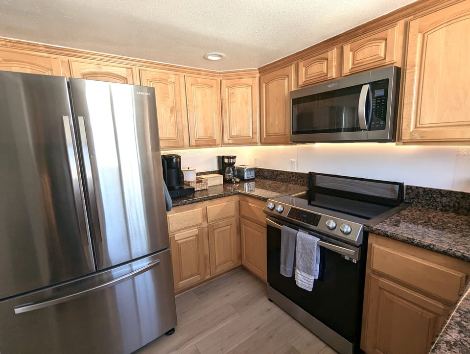 Well stocked kitchen with high end appliances