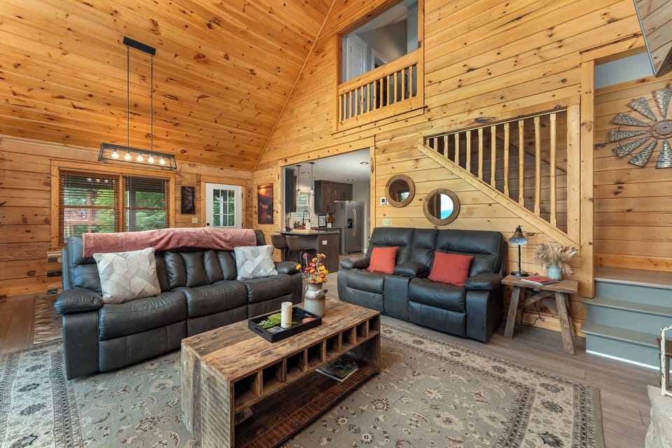 Kick back and relax on the plush leather sofas — whether you're enjoying a movie on the smart TV or cozying up by the fireplace, comfort is guaranteed.