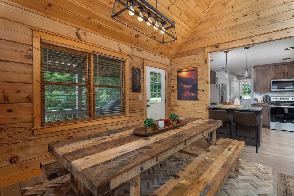 Enjoy every meal with a view — our dining area sits right beside the kitchen and looks out to stunning mountain scenery.