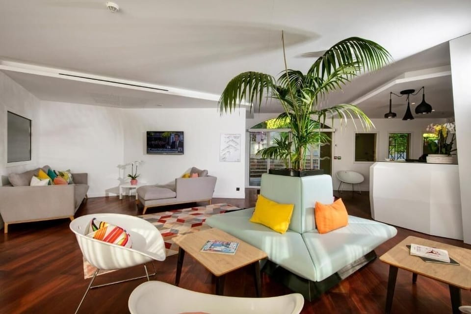 Stretch out in the airy lounge with designer seating.