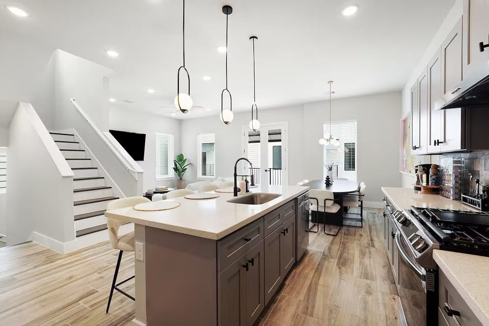 The open concept kitchen has a great view of the living and dining room.