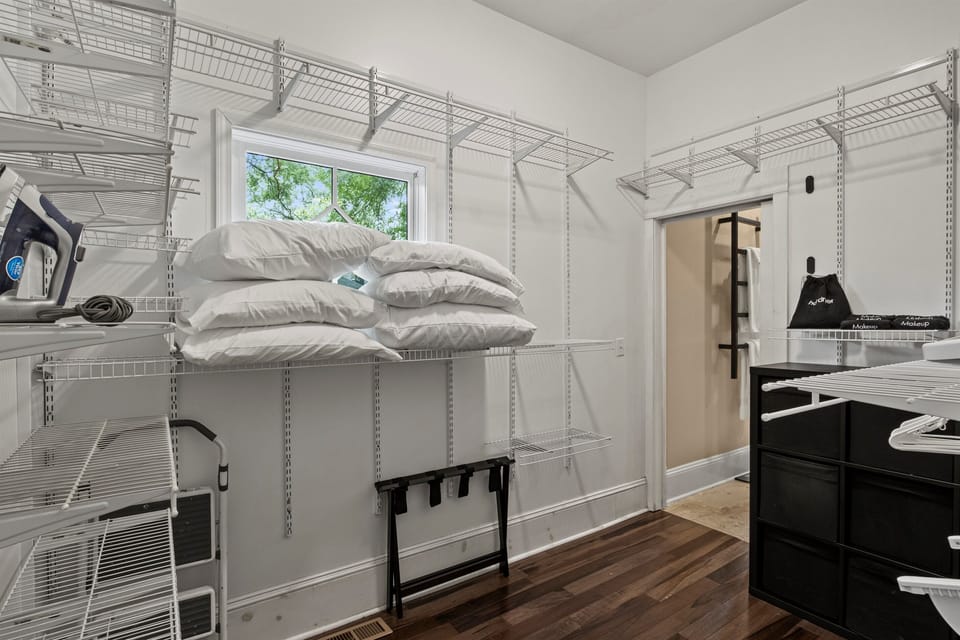 Extra linens, iron & storage closet