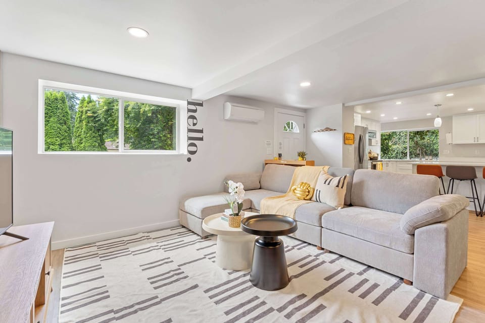 Seamless flow between living and kitchen spaces, designed for gatherings.