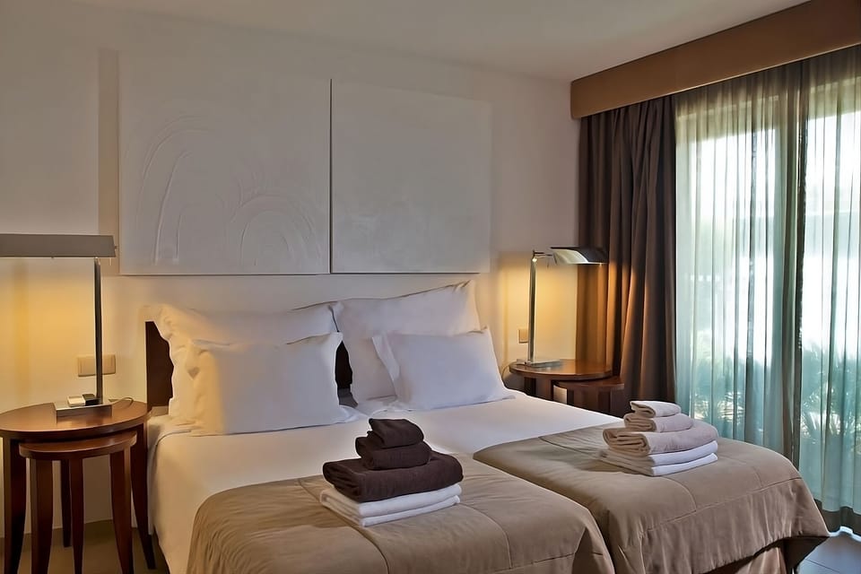 Settle into twin comfort with soft lighting for restful nights.