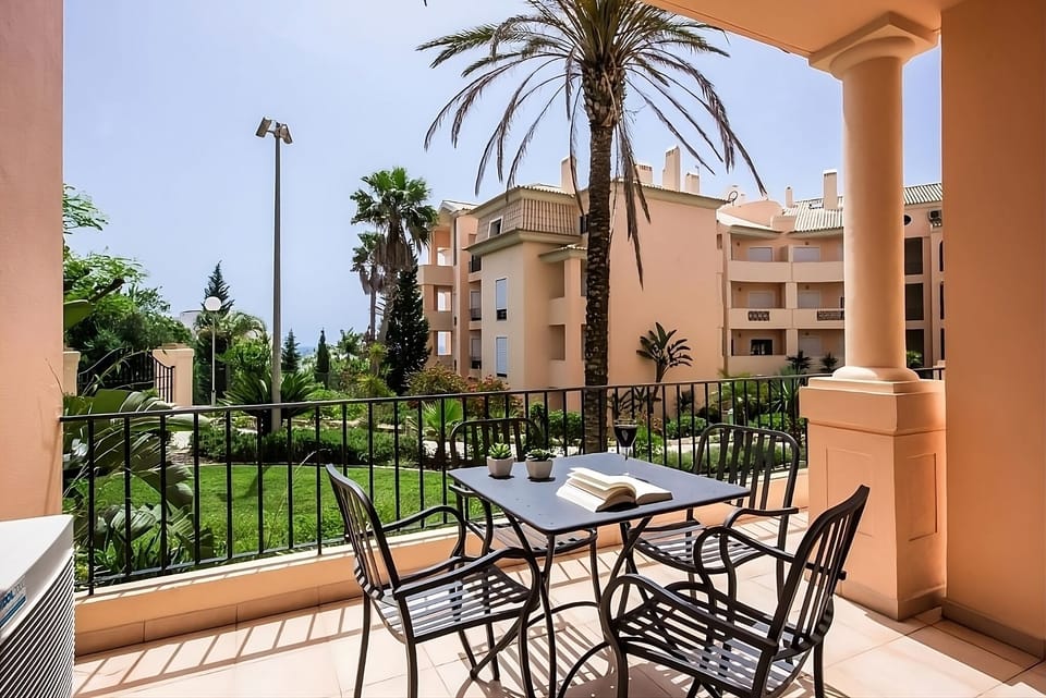 Sip morning coffee overlooking lush gardens and swaying palms.