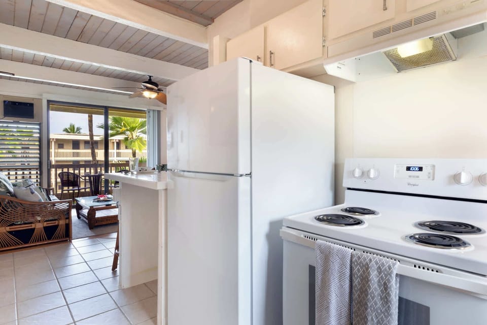 Fully equipped kitchen ready for island feasts and fresh finds