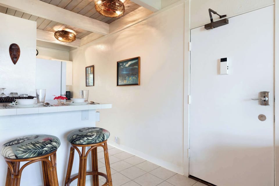 Intimate island dining at the kitchen bar for two
