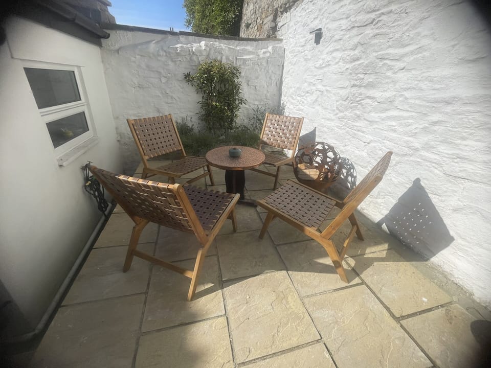 seating area in the little cottage garden