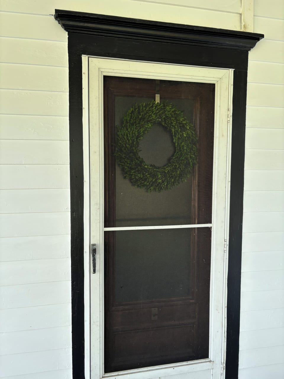 Front door on porch