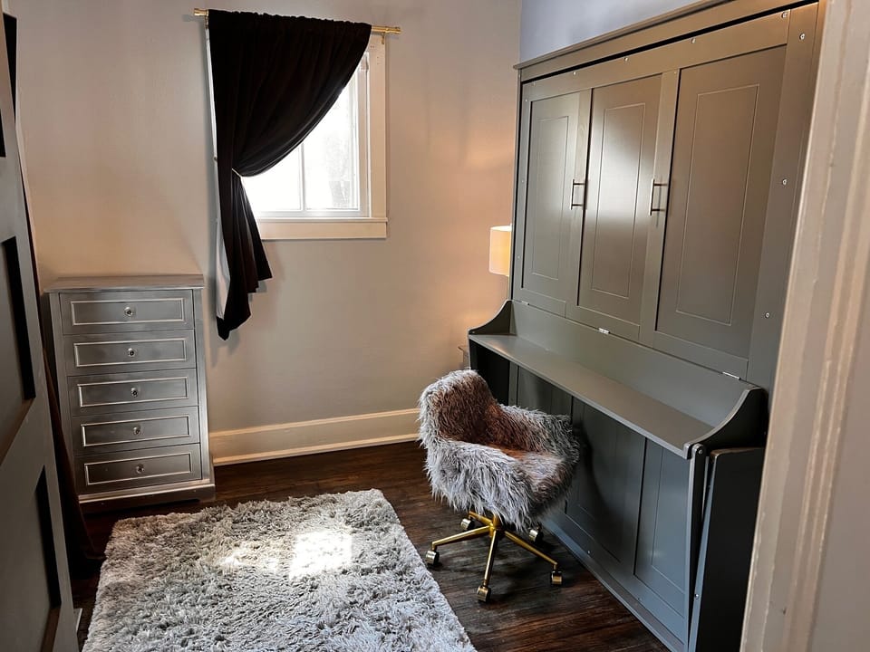 2nd smaller bedroom/office with queen murphy bed and 42" LED TV