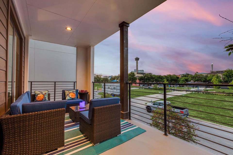 2nd floor Balcony:  6 piece sectional with view of Tower and Alamodome.
