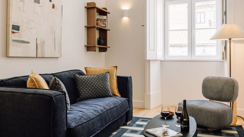 A peaceful living area with soft tones — perfect for relaxing after a day exploring Lisbon.
 #AndoLiving #Portugal #Santos #LisbonVibes #CozyMoments
