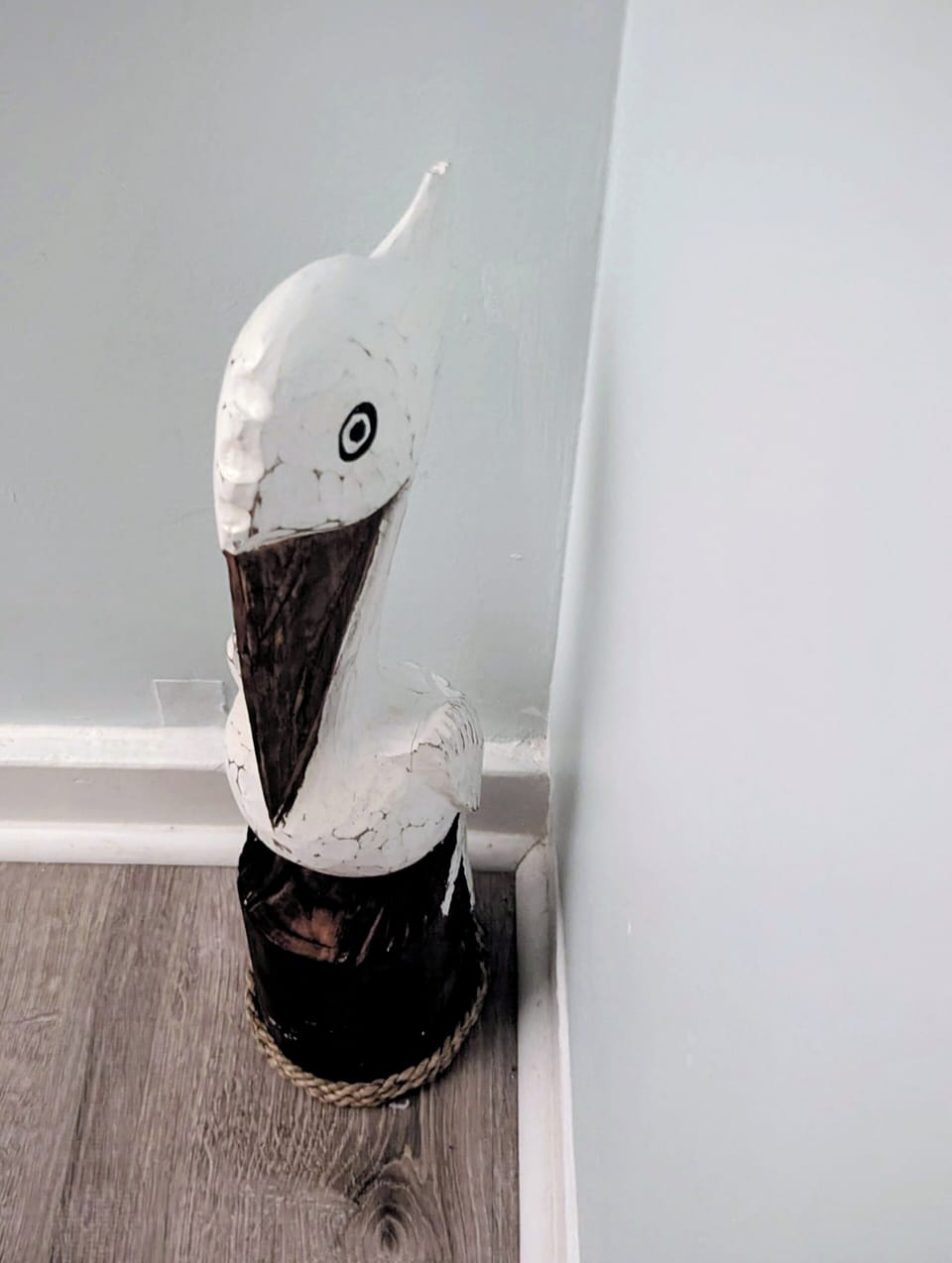 Pete the Pelican perching on the staircase.