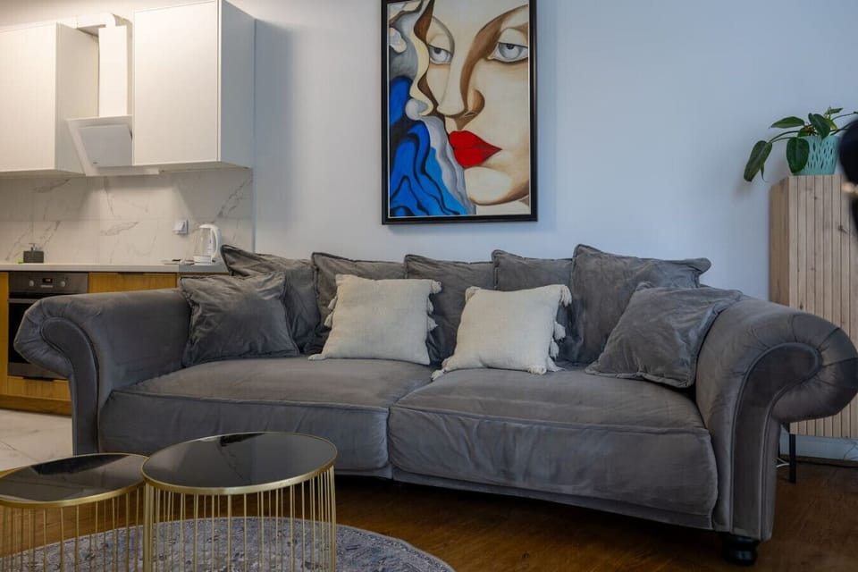 Living Room with Sofa, Smart TV and Dining Table | Book Now with RENTUJEMY.COM