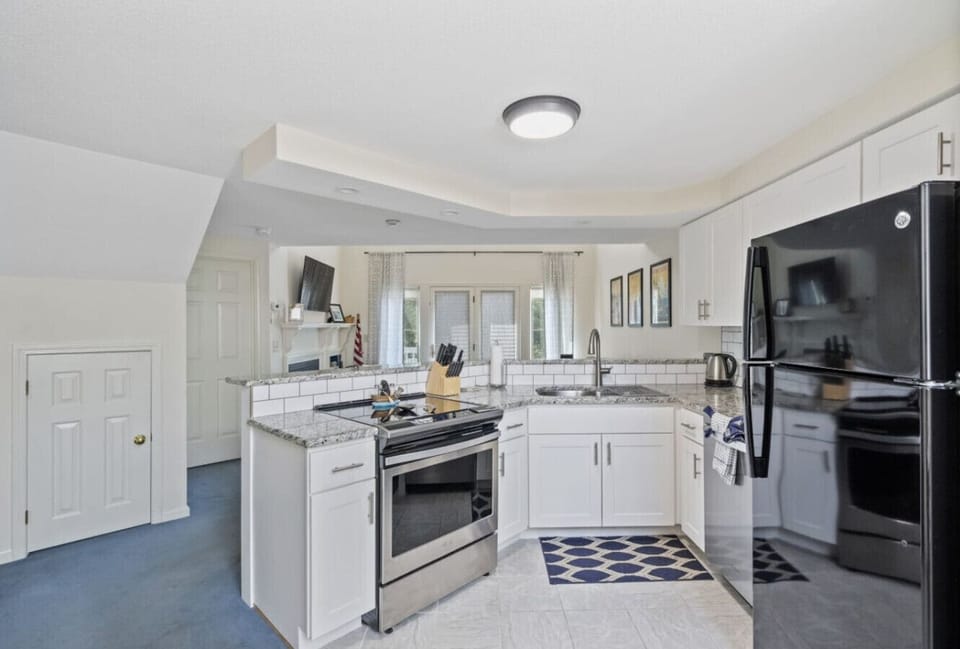 Cook, dine, and connect in this modern, fully stocked kitchen.