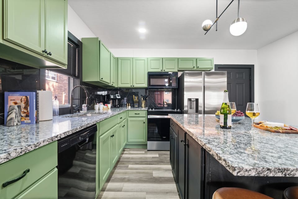 Modern kitchen with island & full amenities.