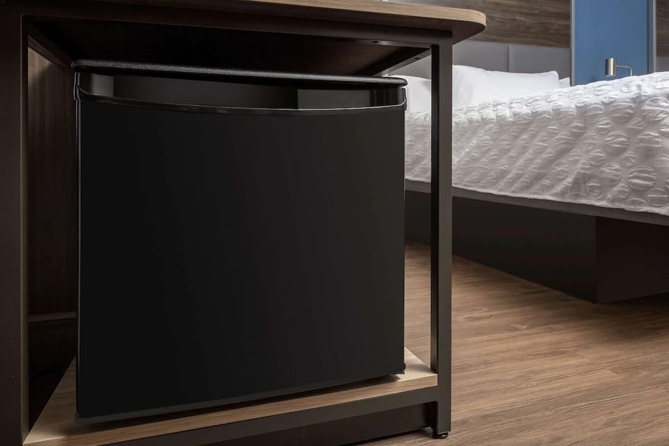 Grab chilled drinks anytime with the convenient in-room mini fridge.