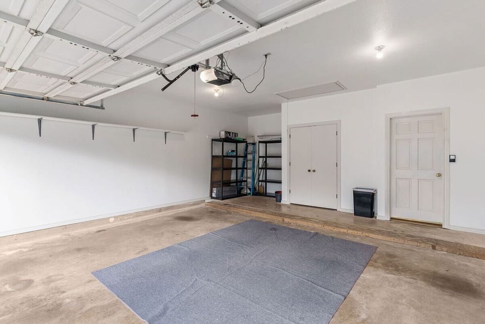 Large attached garage with ample room for 2 large vehicles