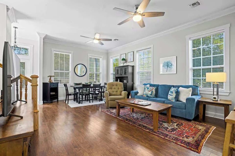 Main House Living Room: Stylish space with vibrant decor, perfect for relaxing or gathering with friends!