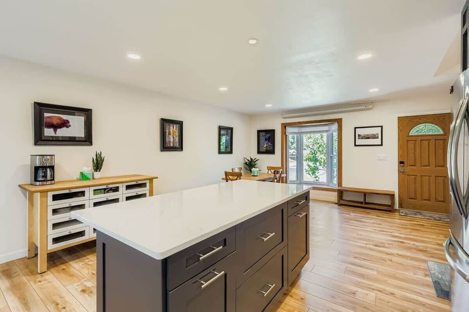 Open-concept front entry, kitchen, and dining area designed for comfort and functionality