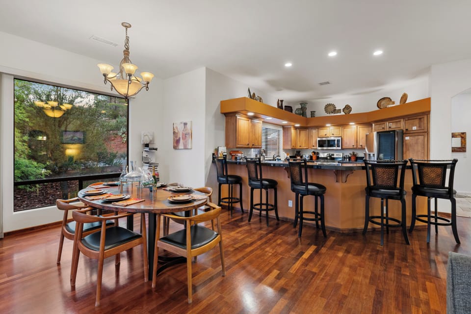 Kitchen / dining: real hand sanded & stained hard wood flooring, copper table