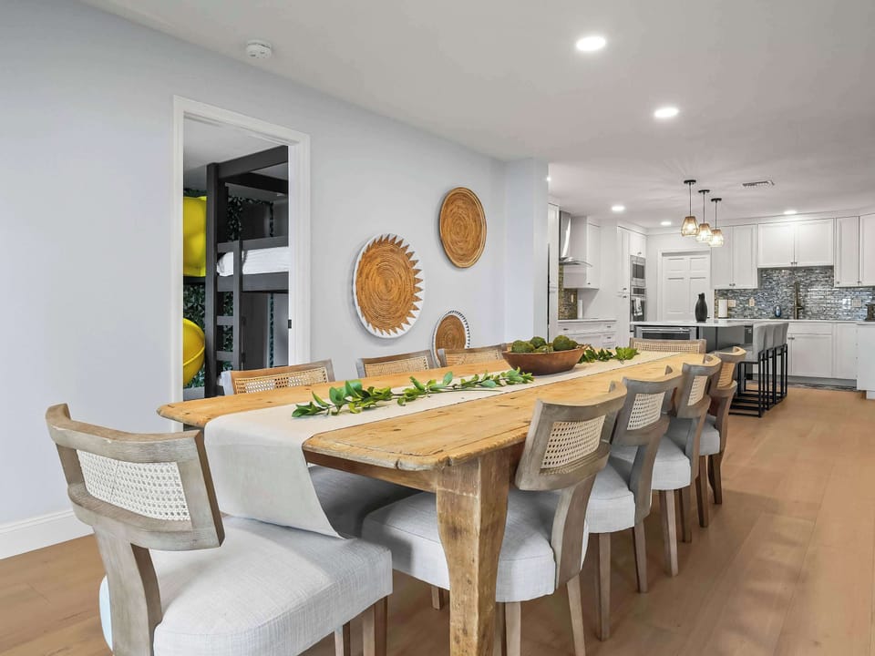 The kitchen sits right next to the dining area, so meals go from stove to table in seconds — with gorgeous lake views as your backdrop.
