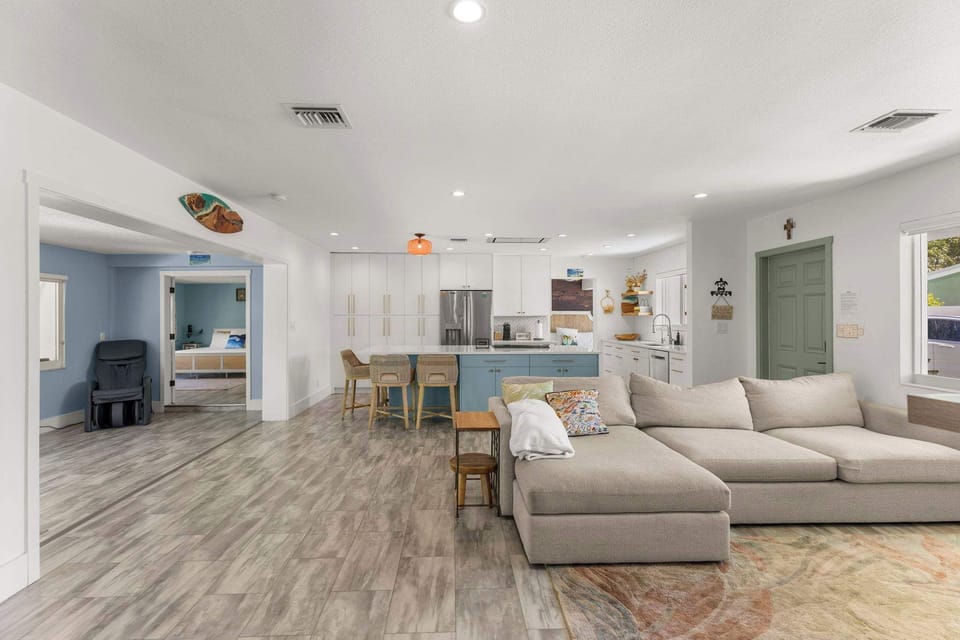 Gather 'round, ye hungry travelers! Our spacious living and kitchen area is the perfect spot for culinary adventures and cozy couch hangouts. Warning: May result in spontaneous dance parties and late-night snack raids.