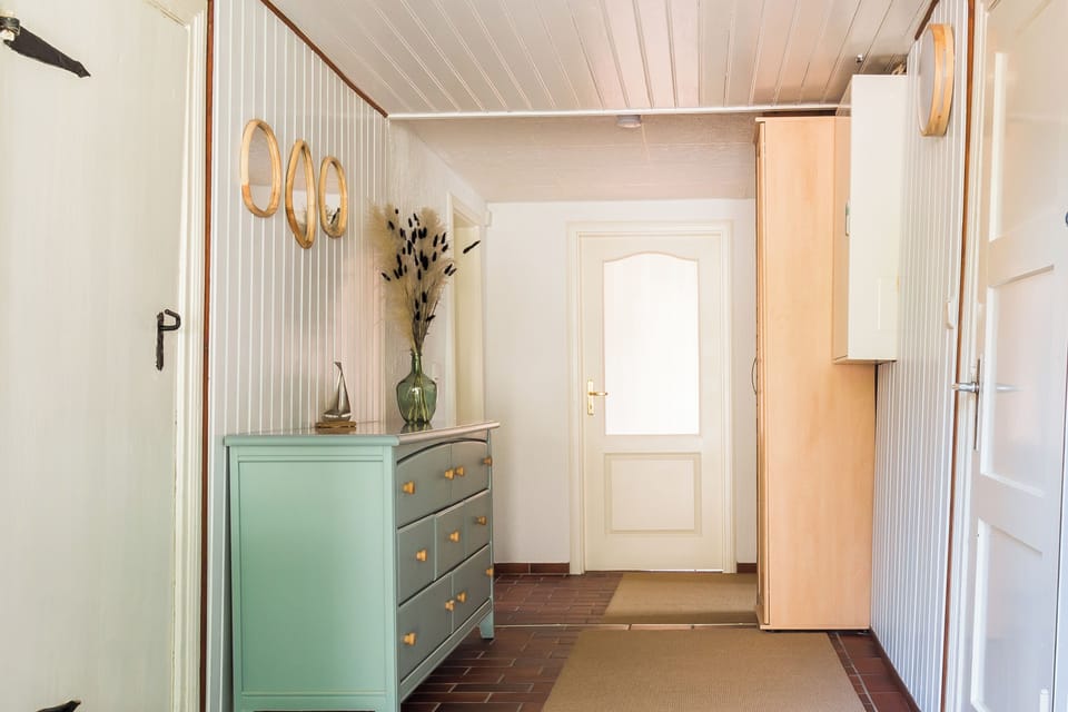 Entrance Area with Mint Green Dresser