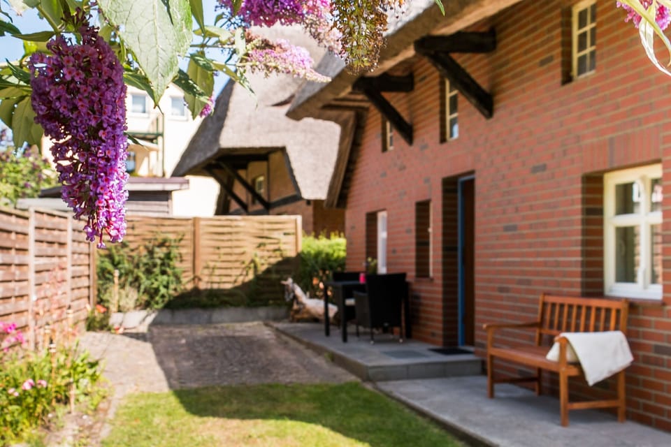 Exterior view of a vacation home with garden