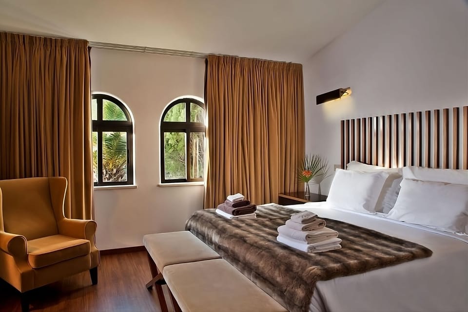 Linger by the arched windows and relax in quiet comfort.
