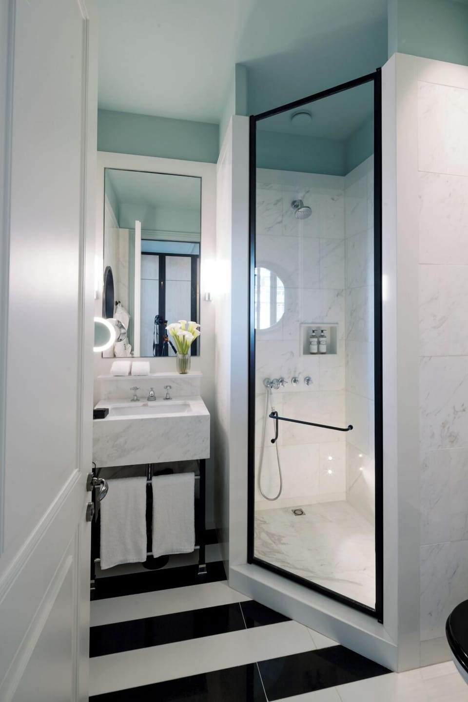 Start your day with bright vanity lighting and luxe finishes.