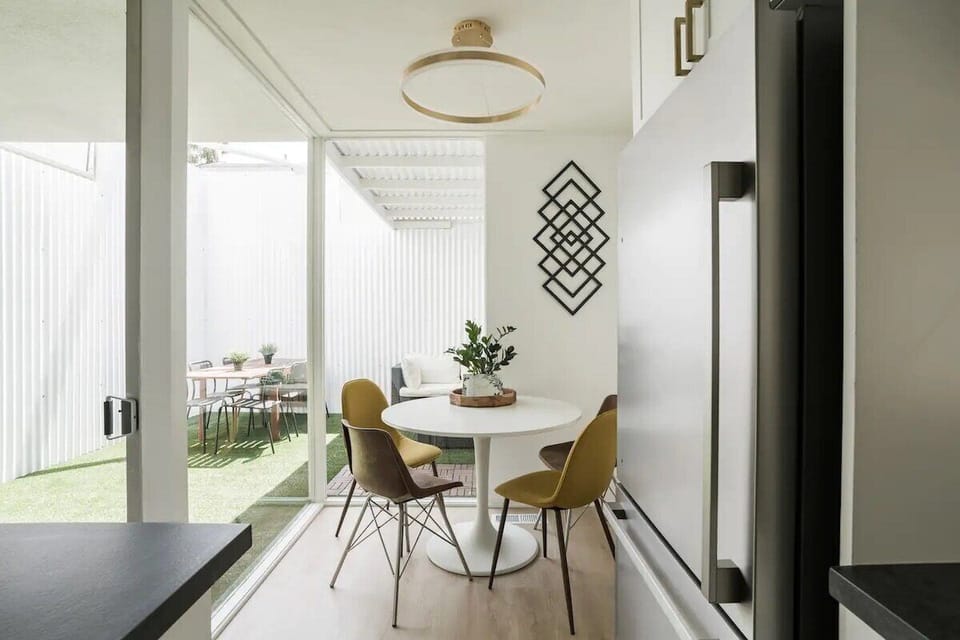 Cutest little dining nook - perfect for working remote or enjoying morning coffee. Also perfect for a work station with power under the table and natural light.