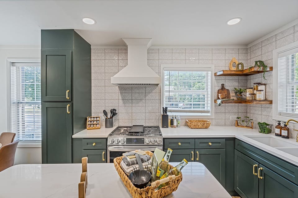 The beautiful kitchen is fully stocked to make meals easy to prepare.