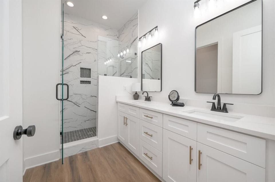 Beautiful tile shower and double sinks
