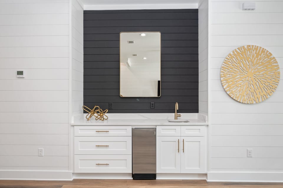 1st floor wet bar with sink and ice maker