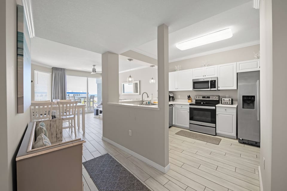 Open kitchen, dining & living area designed for easy time together.