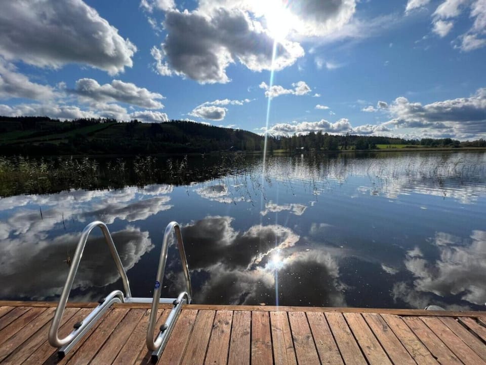 Take a refreshing dip in the clear lake waters or simply soak up the sun on your private pier.