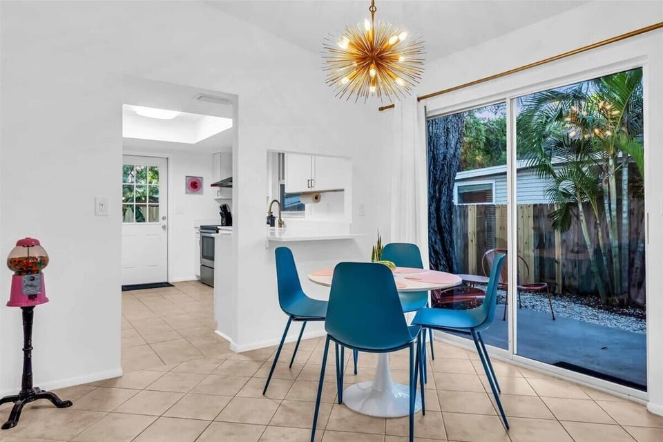 Dining area with a table and 4 chairs