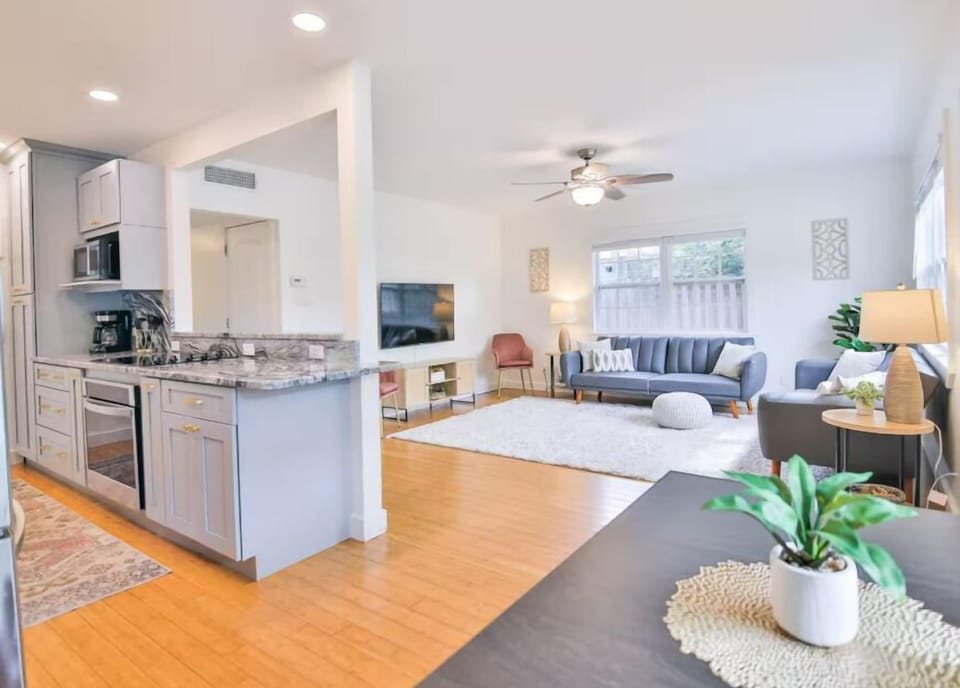 The kitchen has a wall cutout so you can cook and entertain all in one!