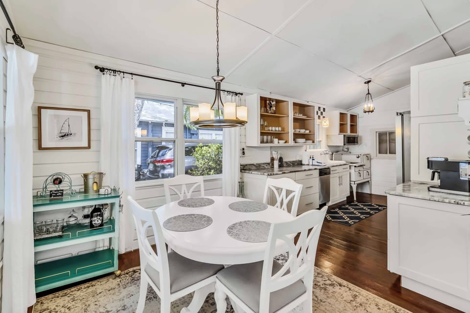 The dining room is located right off the kitchen and entrance area