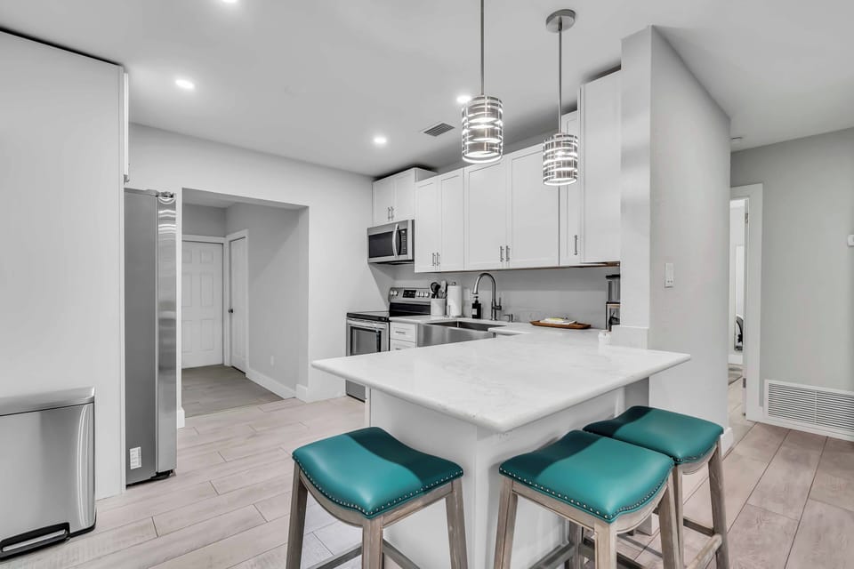 A beautiful kitchen island with bar stool seating