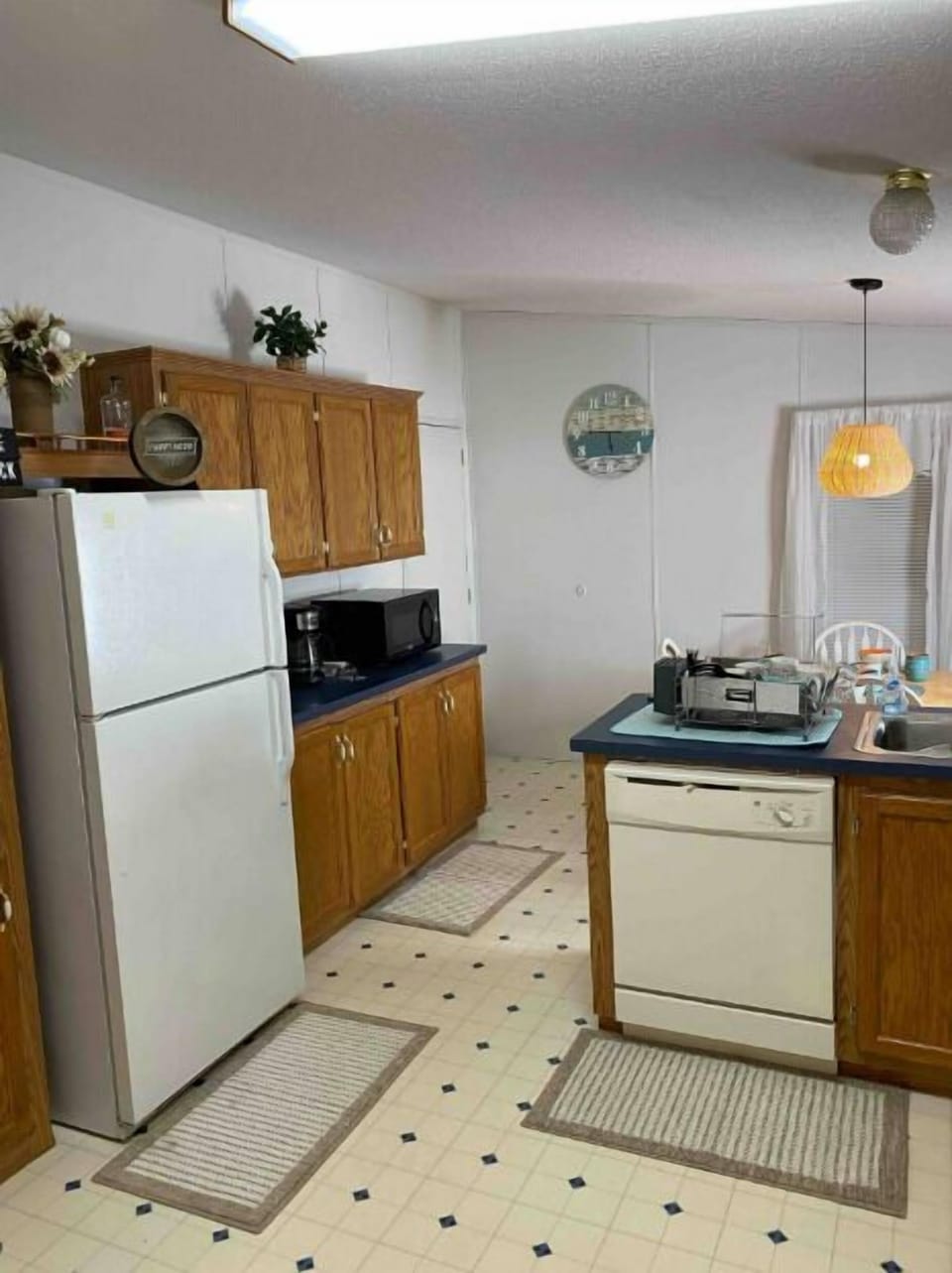 Kitchen with dishwasher, microwave and full-size refrigerator!
