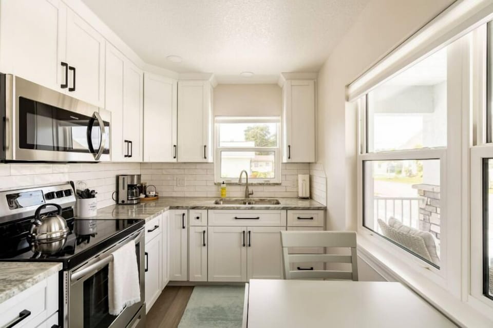 Kitchen and dining table with bright sunlight!