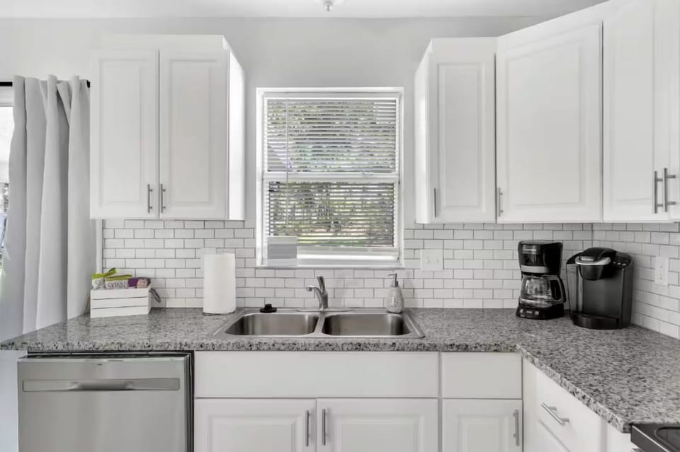 Kitchen sink with a beautiful outside view.