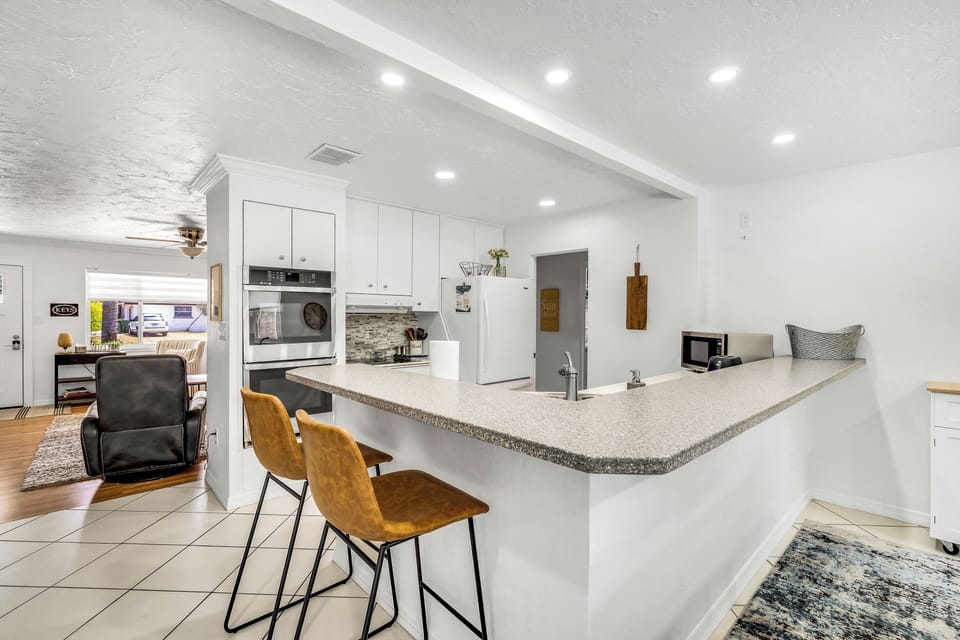 The full-size kitchen comes stocked with all your basic cooking needs
