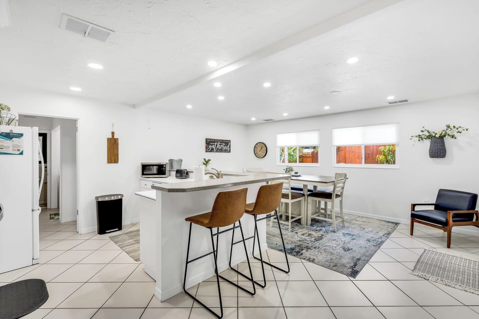 The kitchen and dining area provide plenty of space to prepare meals and enjoy them together