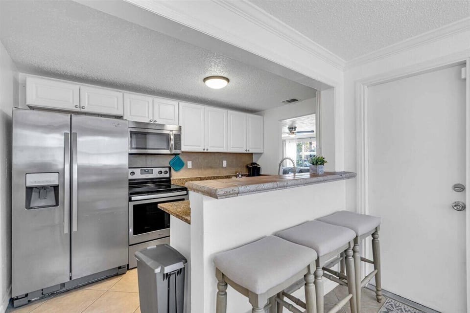 The full-size kitchen comes stocked with basic cookware and utensils so you can enjoy home cooked meals even on vacation